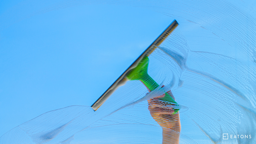 Cleaning A Glass Shower Screen with a Wiper